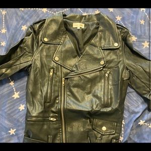 Leather jacket with assorted patches